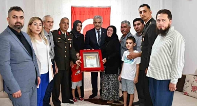 DEVLET, TOPRAK AİLESİNİ ONURLANDIRDI